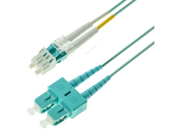 Snor MM DPX LC/PC-SC/PC xx m 50/OM3 BIF 2x ø2mm Aqua 